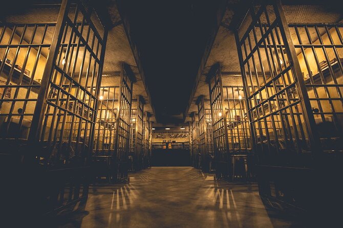 Alcotraz Prison Cocktail Experience in Liverpool - Orange jumpsuits and a Liverpool jailhouse entrance