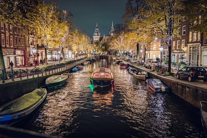 Amsterdam 2-Hour Evening Cruise With Live Guide and Bar - The Stopera and the city’s mixed emotions