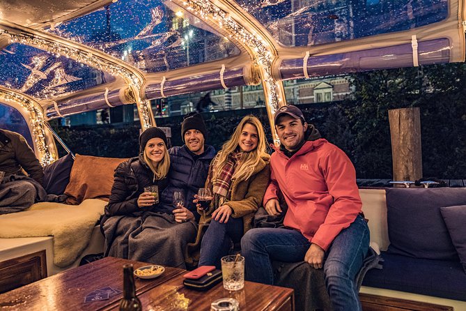 Amsterdam 2-Hour Evening Cruise With Live Guide and Bar - Anne Frank House and Amsterdam’s difficult stories