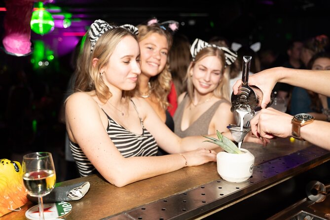 Amsterdam: City Centre Bar Crawl and Nightlife Experience - Starting in Amsterdam’s central squares