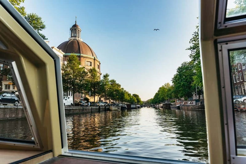 Amsterdam: City Centre Canal Cruise & Free Flower Cocktail - Rijksmuseum, Skinny Bridge, and the Magere Brug