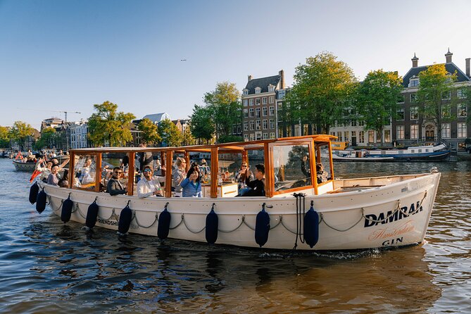 Amsterdam: Luxury Boat Cruise Unlimited Cocktails, Beers & Wines - Dutch Cheese Snacks and a Small Warning