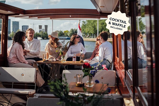 Amsterdam: Luxury Saloon Boat Cruise with Cocktails & Waffle - A relaxed hour on Amsterdam’s waterways
