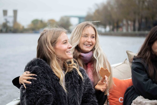 Amsterdam: Luxury Saloon Boat Cruise with Cocktails & Waffle - Drinks, waffles, and the confusing package details
