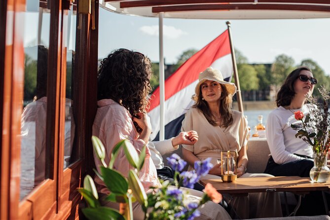 Amsterdam: Luxury Saloon Boat Cruise with Cocktails & Waffle - Is the Friendship Amsterdam cruise worth booking?