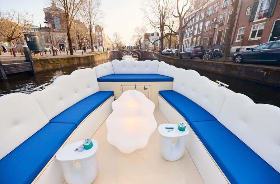 Amsterdam: Smoke & Cruise on covered Cannabis Boat With Bar - The Red Light District and the first ten minutes