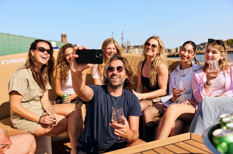 Amsterdam: Spanish Guided Open Boat Cruise with Bar Onboard - Key Points Before You Book