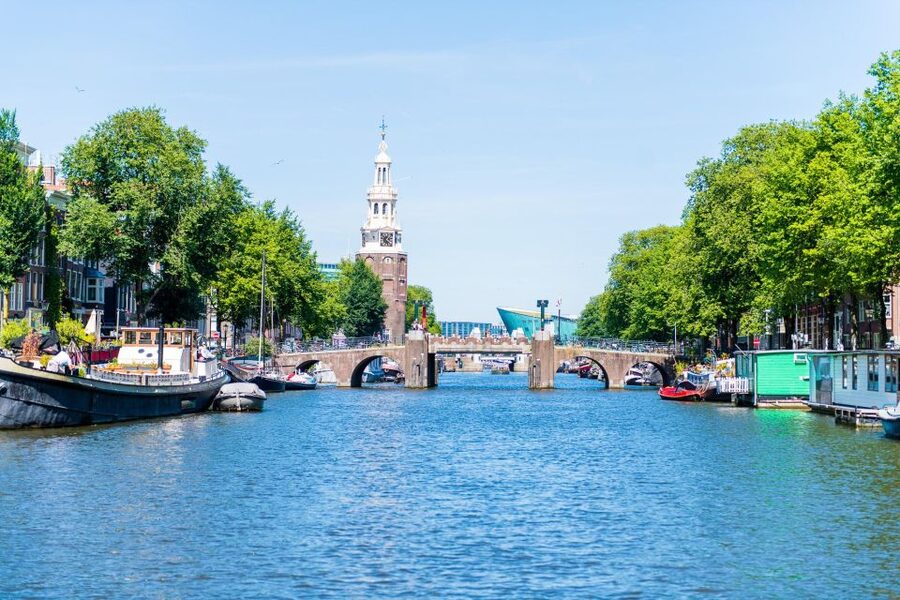 Amsterdam: Traditional Canal Cruise with Bar on Board - Gliding beneath Magere Brug