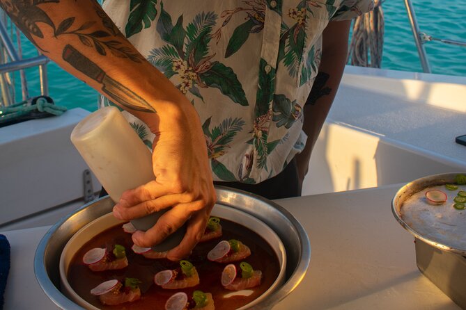 Bacalar - Gourmet Tour in Private Catamaran with Cocktails Included - Food on board: guacamole, raw fish, and sushi