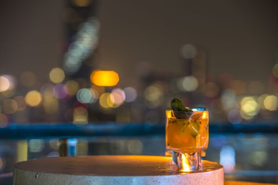 Bangkok: Lebua Rooftop Bar Reservation & Round-Trip Transfer - The refined mood of Distil at the 64th floor