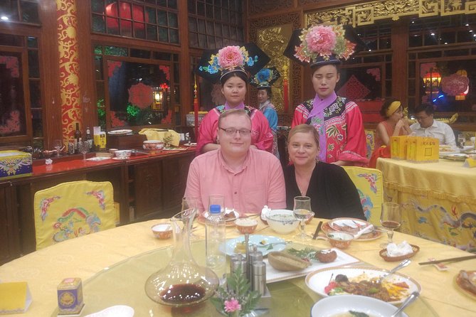 Beijing Imperial Dining Experience at Bai Jia Da Yuan Restaurant with Houhai Lake Bar Tour - Seeing Beijing’s Olympic lights from a private vehicle