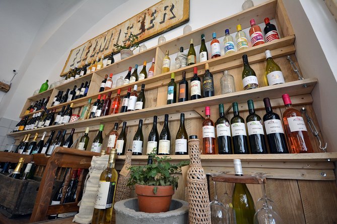 Budapest Wine Bar Tour with Sausage and Cheese Charcuterie - Moving between well-known and quirky wine bars