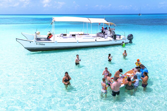 Catamaran Snorkeling to El Cielo and The Money Bar Beach Club - Drinks, snacks, and the onboard atmosphere
