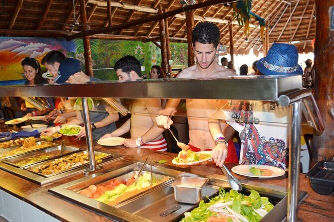 Catamaran Tour to Isla Mujeres from Cancún with Bar and Lunch - Sailing, Drinks, and the Floating Party