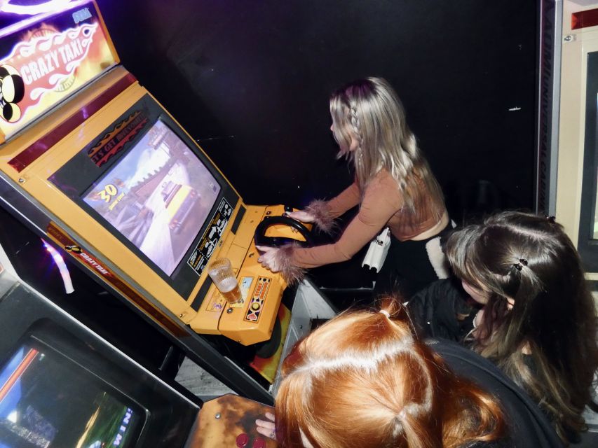 Copenhagen: Social Nightlife Pub Crawl with Shots & Games - Playing PacMan and pinball at the arcade bar