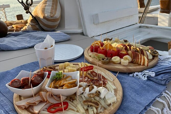 Corfu: Sunset Cruise on a Wooden Vessel with Cocktails & Bites - Mouse Island and the Kanoni sunset
