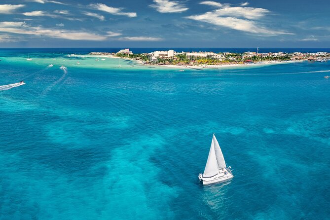 Discover Isla Mujeres: Catamaran, Snorkeling, and "Ice Bar" - Buffet lunch at the beach club
