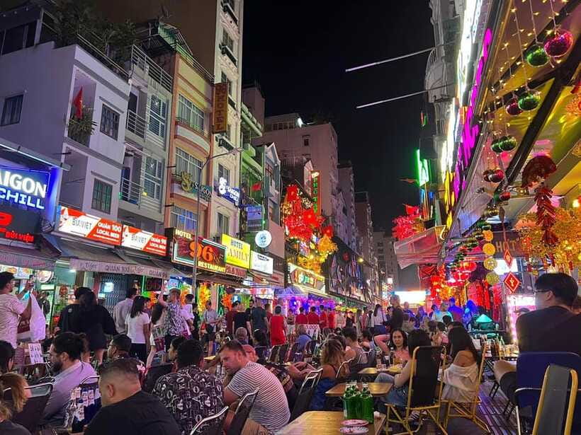 Free E-sim Saigon Nightlife Hopping Tour - What the guide adds to the evening
