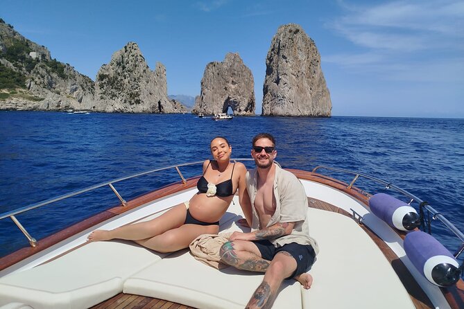 From Positano : Elite Capri Boat Day Free Bar, Brunch & City Walk - A small boat from Positano to Capri