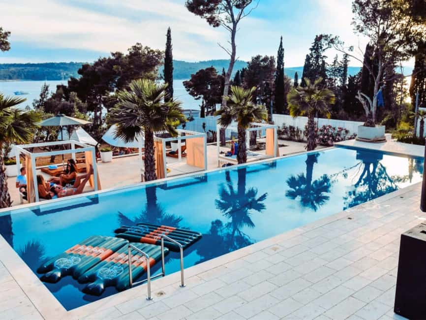 From Split: Brač Island Beach Bar and Pool Party - Milna’s private resort setting