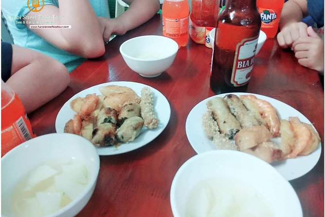 Hanoi Nightlife Street Food Tour with Small group - The first taste at a Hanoi hawker market