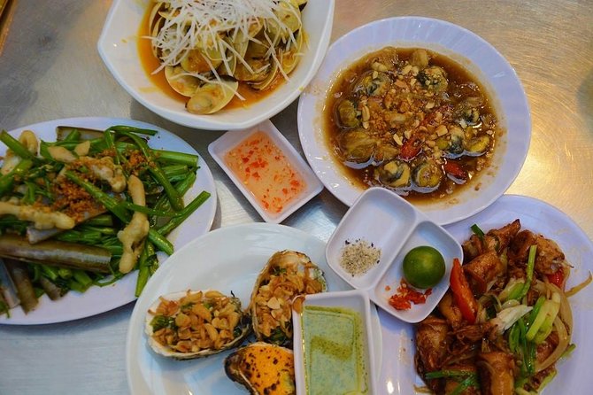 Ho Chi Minh Nightlife & Street Food Tour By Motorbike - Cho Lon and Phố Tau Sai Gon show another side of the city