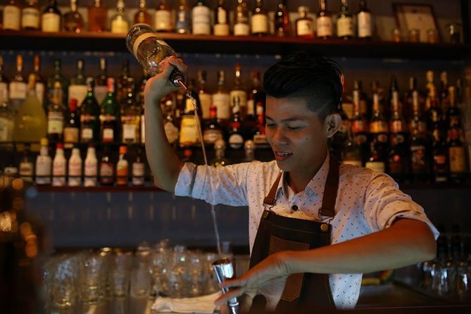 Ho Chi Minh Nightlife & Street Food Tour By Motorbike - Bitexco Financial Tower gives you a quick city-center start