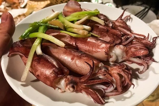 Hoi An Nightlife And Food Tour By Electric Scooter - Seafood and a restaurant with a social purpose