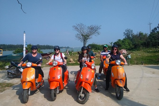 Hoi An Nightlife And Food Tour By Electric Scooter - Finishing with a cocktail by the river