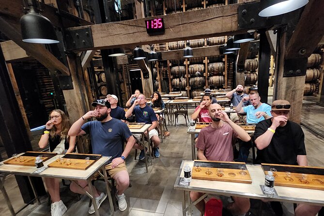 Jack Daniel Distillery Tour with Lynchburg & World's Longest Bar - Raising a glass at the 518-foot bar