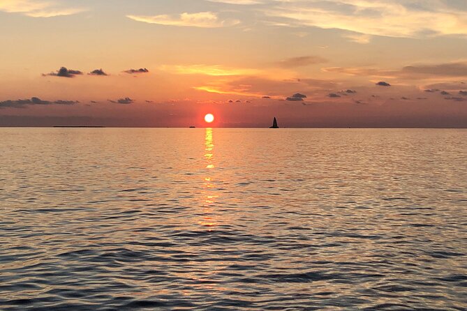 Key West Tiki Bar Sunset Cruise (by the seat) BYOB Adventure - Passing Sunset Pier and Mallory Square by boat