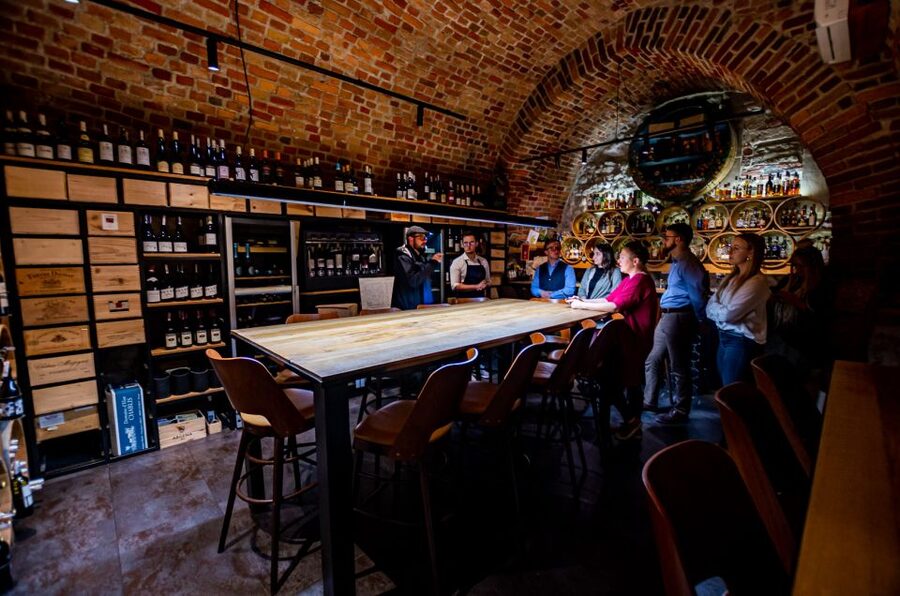 Krakow: Guided Wine Bar Tour with Tastings and Snacks - The first tasting: Polish bottles in a relaxed setting