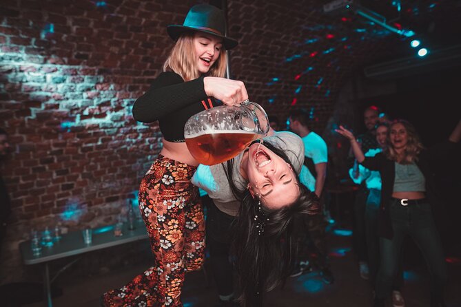 Krakow Pub Crawl with 1 Hr of unlimited alcohol & 4 clubs/pubs - The first hour: drinks, games, and introductions
