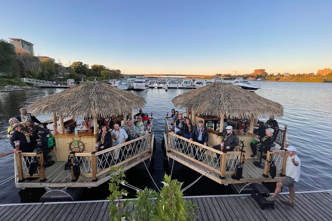 Lilo Floating Tiki Bar on the Ottawa River - Following Parliament Hill and the Ottawa skyline