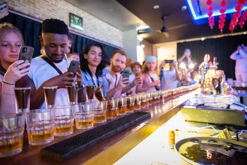 Mad Monkey Hoi An Pub Crawl-Free shot on arrival at each bar - Practical ways to make the night better