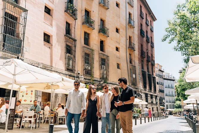 Madrid Local Tapas, Wine Bars & Flamenco Show - Beef cheeks, wine, and Plaza de Santa Ana