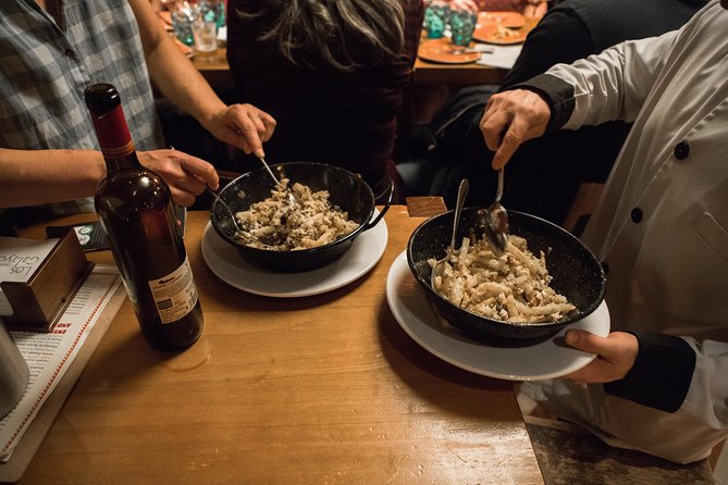 Madrid Tapas & Wine Tasting Walking Tour – Small Group Local Bars - Plaza del Ángel and the wine shop behind the bottles