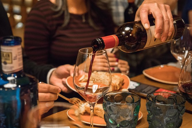 Madrid Tapas & Wine Tasting Walking Tour – Small Group Local Bars - Calle de la Cruz and the open kitchen