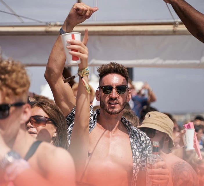Mallorca: Boat Party with Live DJs, Lunch, & Nightclub Entry - Boarding at Soller Cat Boat