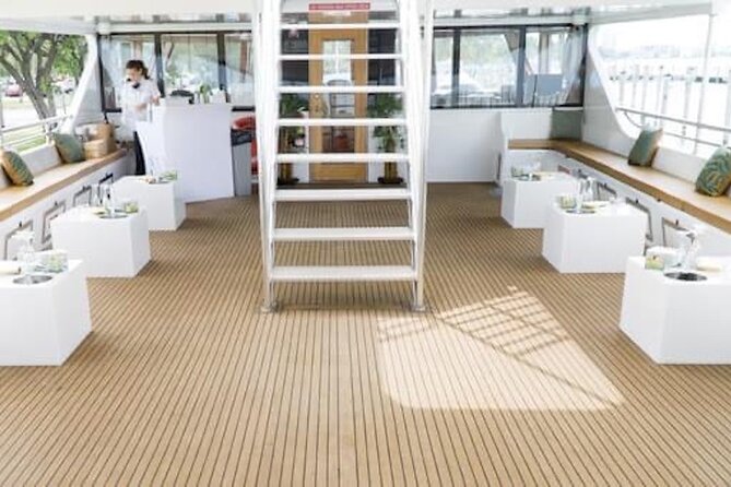Miami Sip & Sea: Cocktail Cruise & Sunset Boat Tour - Leaving Miami’s busy port