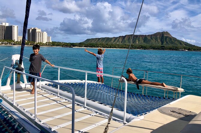 Moana’s Swim’n’Sail Cocktail Cruise Along the Waikiki Coast - Sailing along Waikiki toward Diamond Head