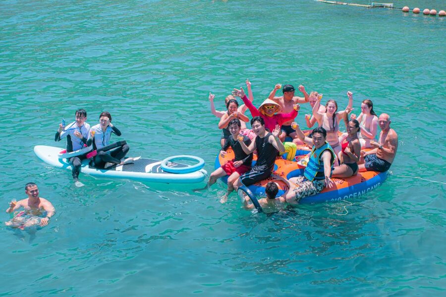Nha Trang: Coral Reef Snorkeling and Floating Bar Party - The afternoon: SUP, basket boats, and the giant waterslide