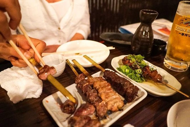 Osaka Bar Hopping Night Walking Tour in Namba (3 bars, 6 tastes) - Minami, Dotonbori, and the famous Glico sign