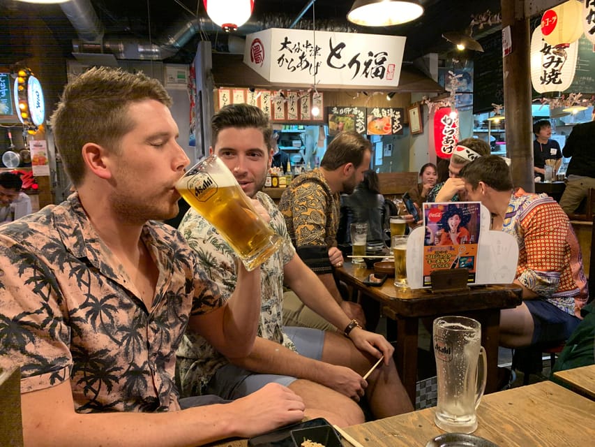 Osaka: Deep Food Tour and Bar Hopping in Namba - The Glico sign photo stop