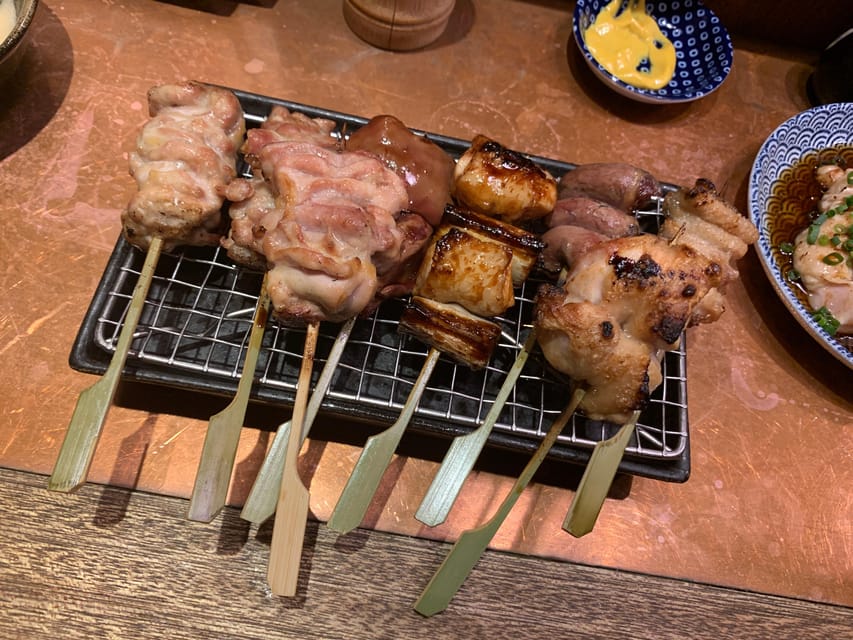 Osaka: Deep Food Tour and Bar Hopping in Namba - Hozenji Temple, a quiet pause in the shopping district