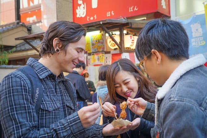 Osaka: Private Food Tour & Bar Hopping in Namba - From flashy signs to tiny historic lanes