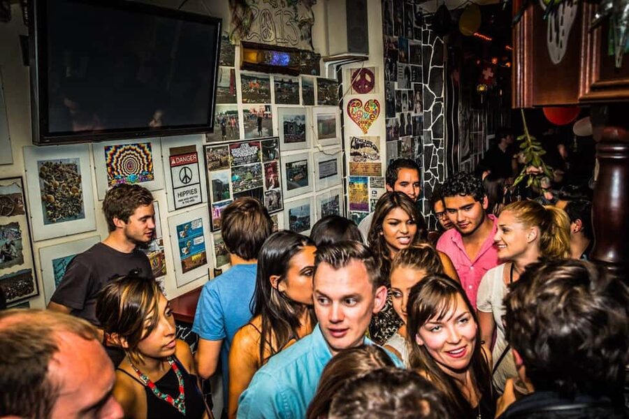 Paris: Pub Crawl with Shots and Nightclub Entry - Moving through central Paris after dark