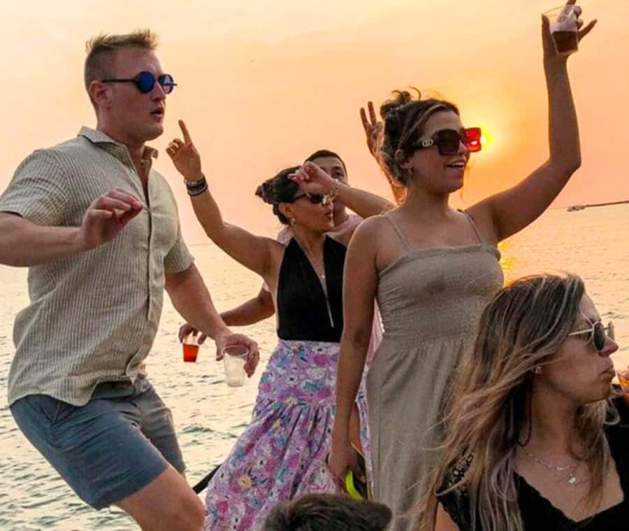 Party Boat in Cartagena Bay with NightClub Ticket - Boarding the long-tail boat and safety briefing