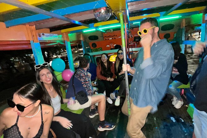 Party Crawl: 6 Nightclubs, DiscoTruck, AfterParty, 1h Openbar pub - The Chiva Rumbera turns transport into the party