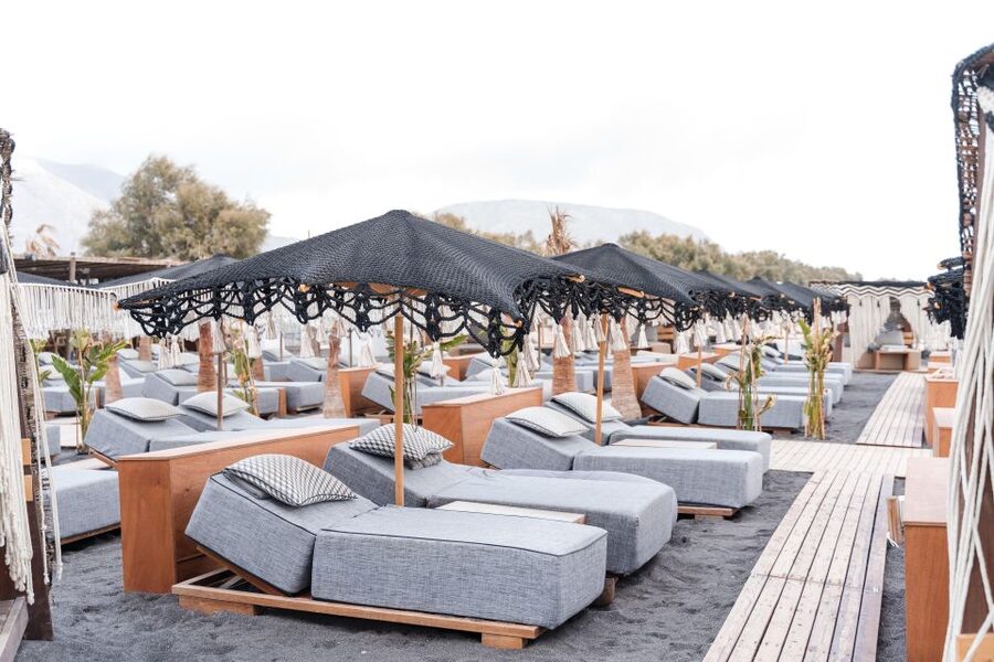 Perivolos Beach: Sun-Bed Experience FortyOne Bar Restaurant - The lava-rock shore and clear Agios Georgios water